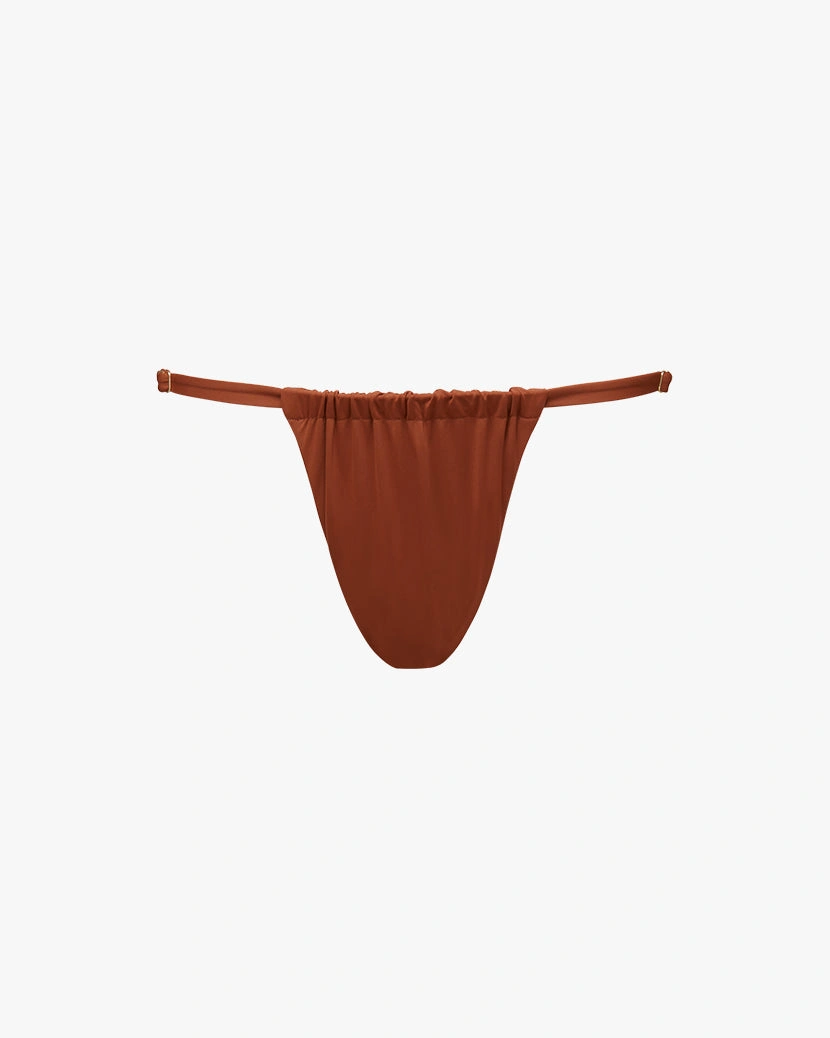 Verstelbare geplooide bikini slip: flatterend, sexy en klaar voor de zomer.